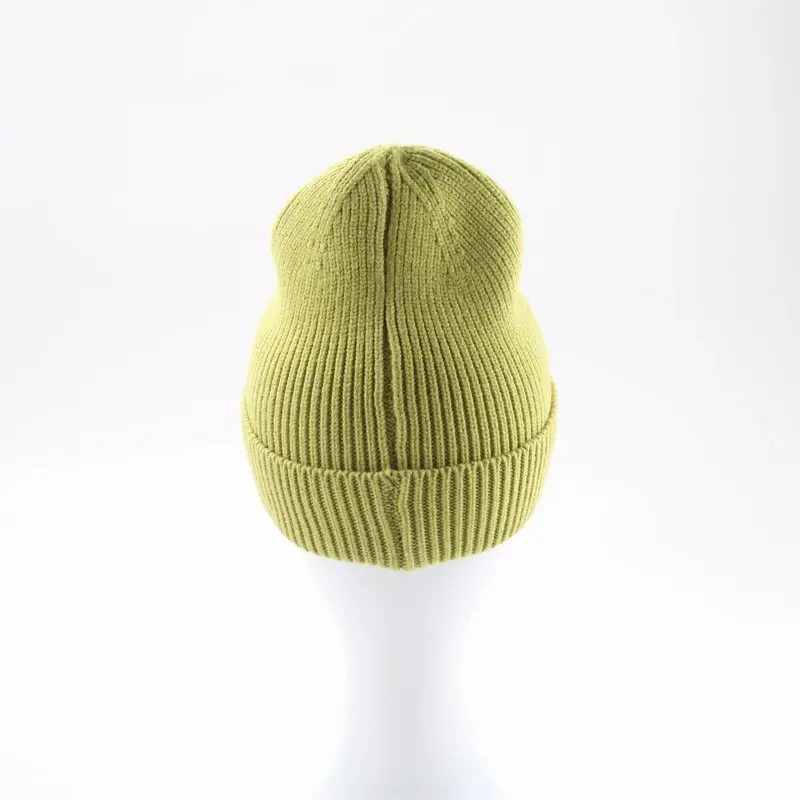Lime-green rib-knit beanie with a folded cuff on a white display form