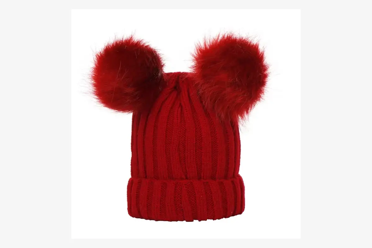 Red rib-knit beanie with two red faux fur pom poms.