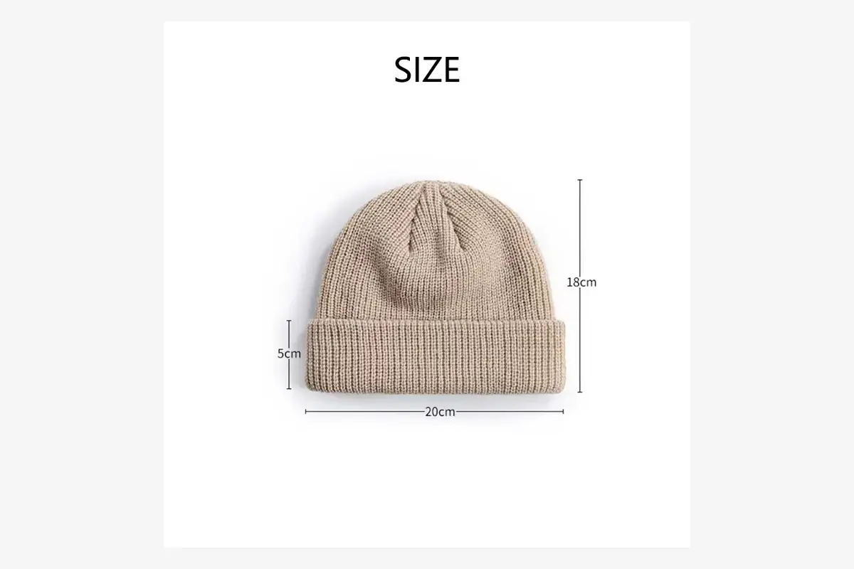 Knit beanie sample with marked width, height and cuff measurements.