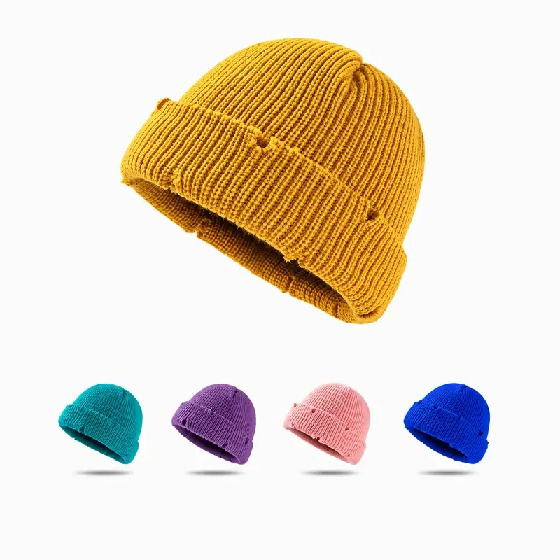 Five short rib-knit skull caps in yellow, teal, purple, pink and blue