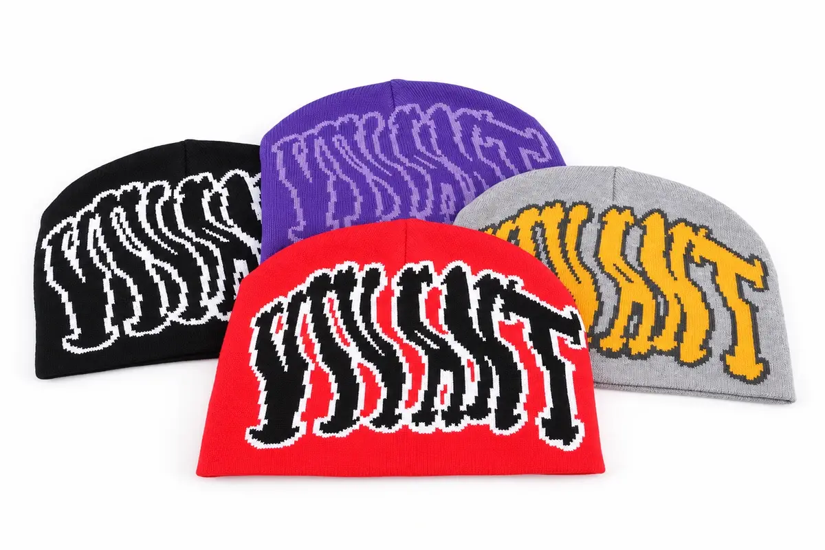 Three cuffless beanies showing crown depth, lower edge and logo placement