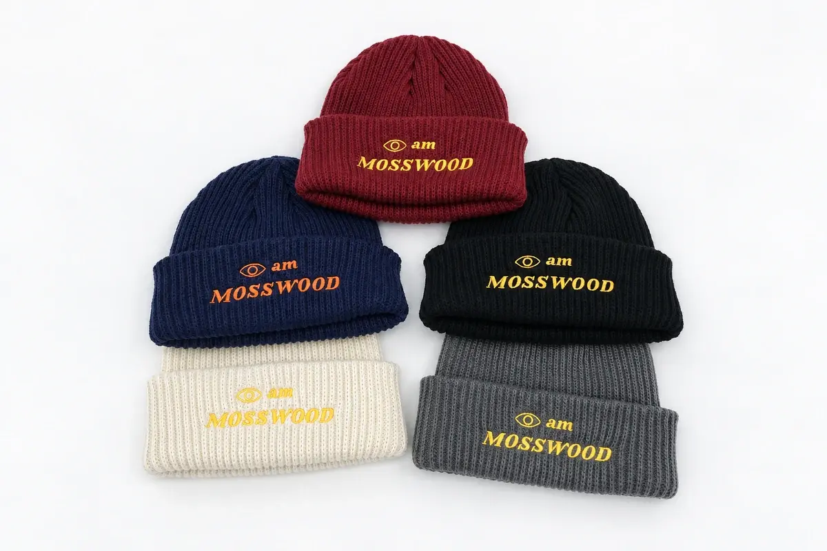 Five short fisherman beanies in navy, red, black, white and gray with ribbed cuffs