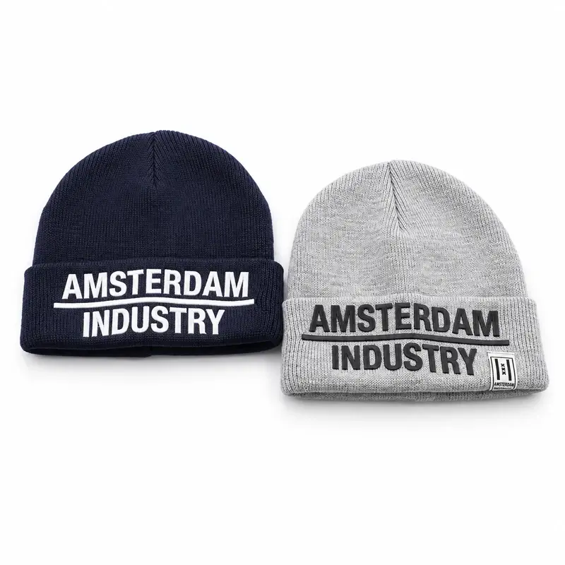 Navy and gray fisherman beanies with embroidered AMSTERDAM INDUSTRY cuff lettering