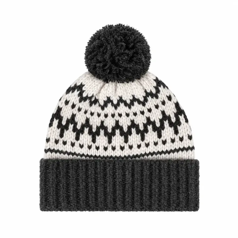 Black and white jacquard pom-pom beanie with a folded cuff