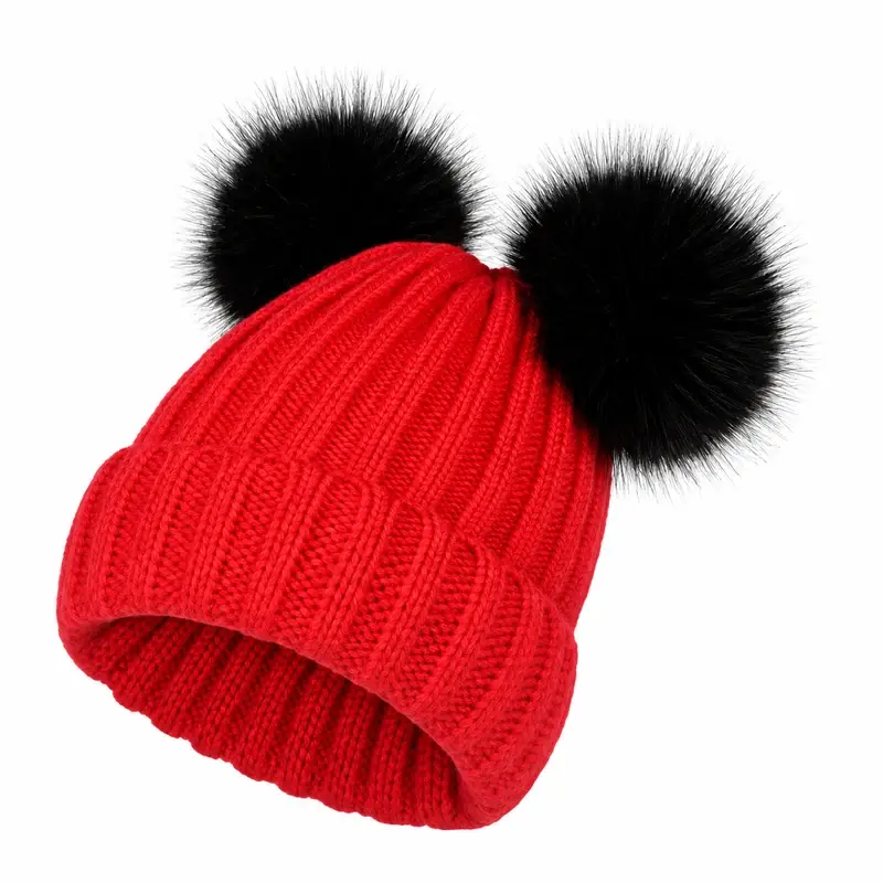 Red ribbed knit beanie topped with two black pom-poms