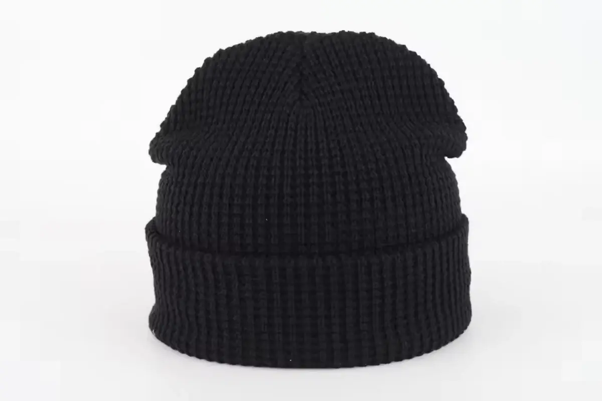 Black rib-knit cuffed beanie viewed from the back