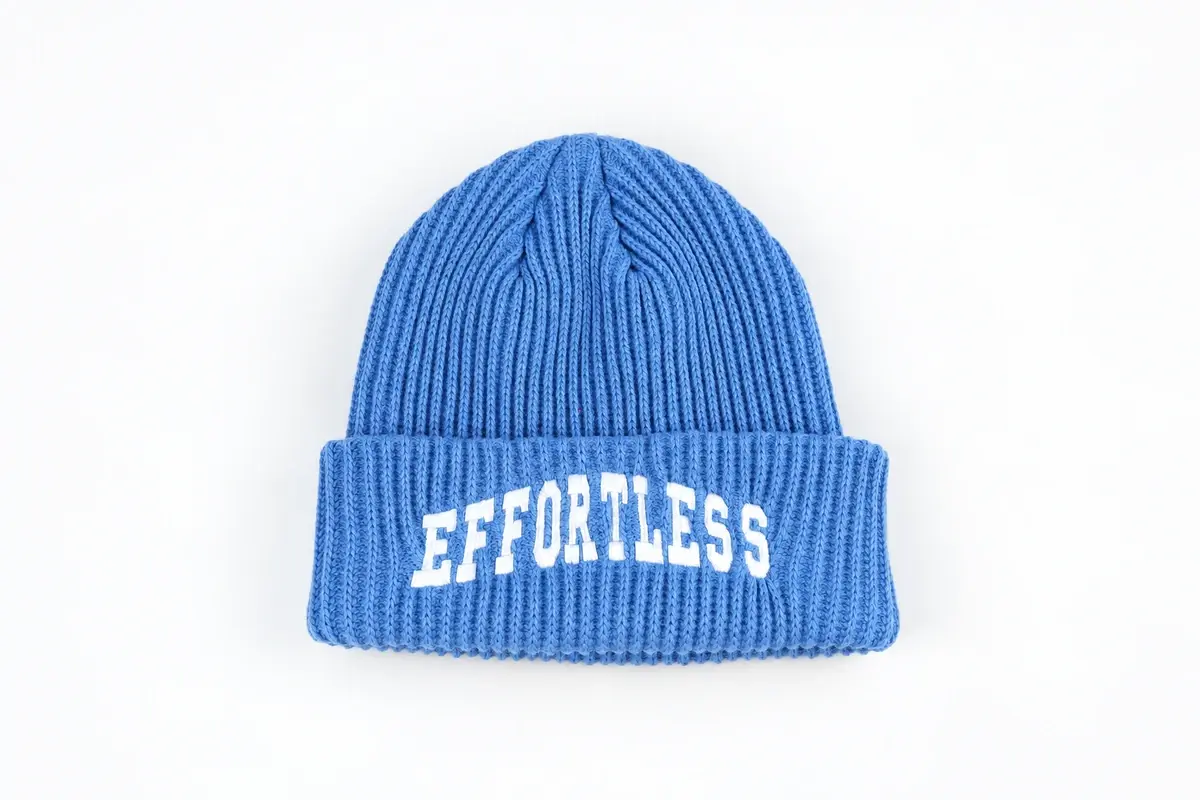 Blue rib-knit cuffed beanie with EFFORTLESS lettering