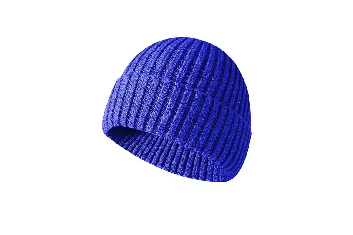 Blue rib-knit beanie showing the knitted shell and folded cuff