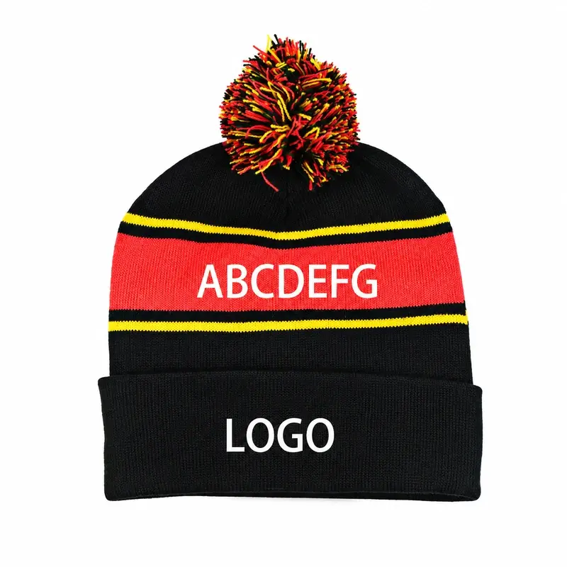 Black knit beanie with a multicolor yarn pom pom
