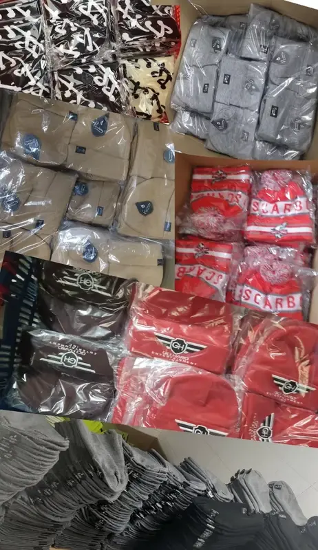 Individually bagged knit accessories arranged for packing