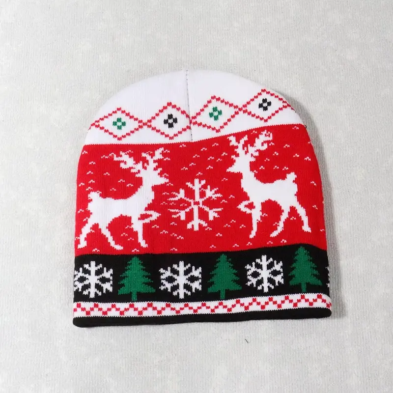 Red and white beanie with knitted reindeer and snowflake bands
