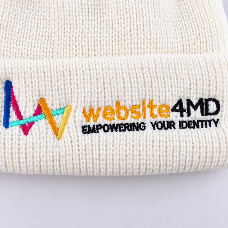 White short beanie with multicolor embroidered artwork and lettering