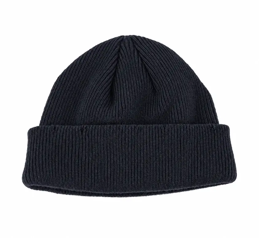 Front view of a plain navy short fisherman beanie with folded cuff