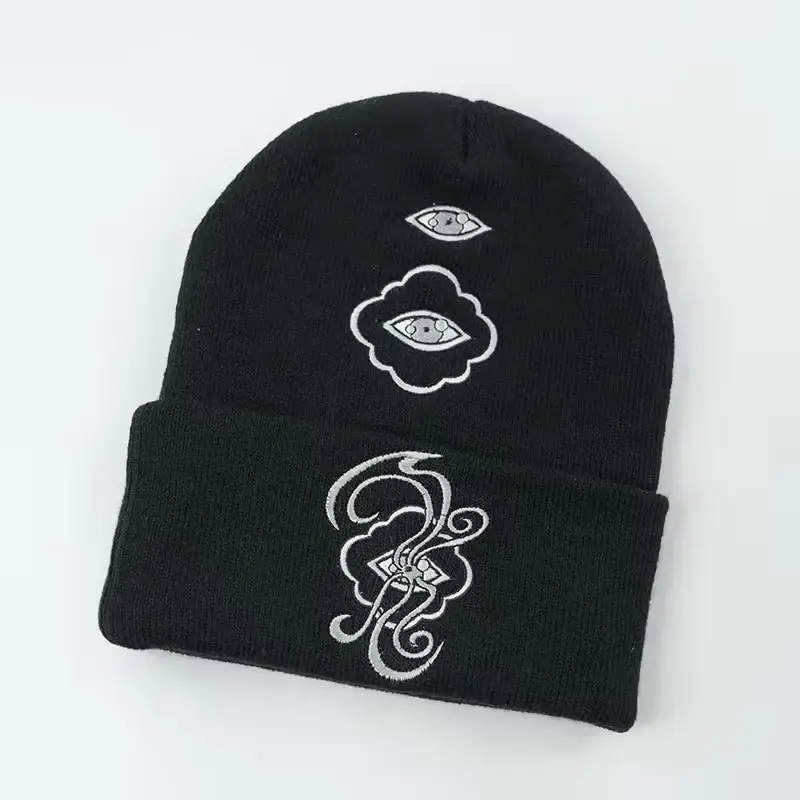 Black cuffed beanie with separate white stitched motifs