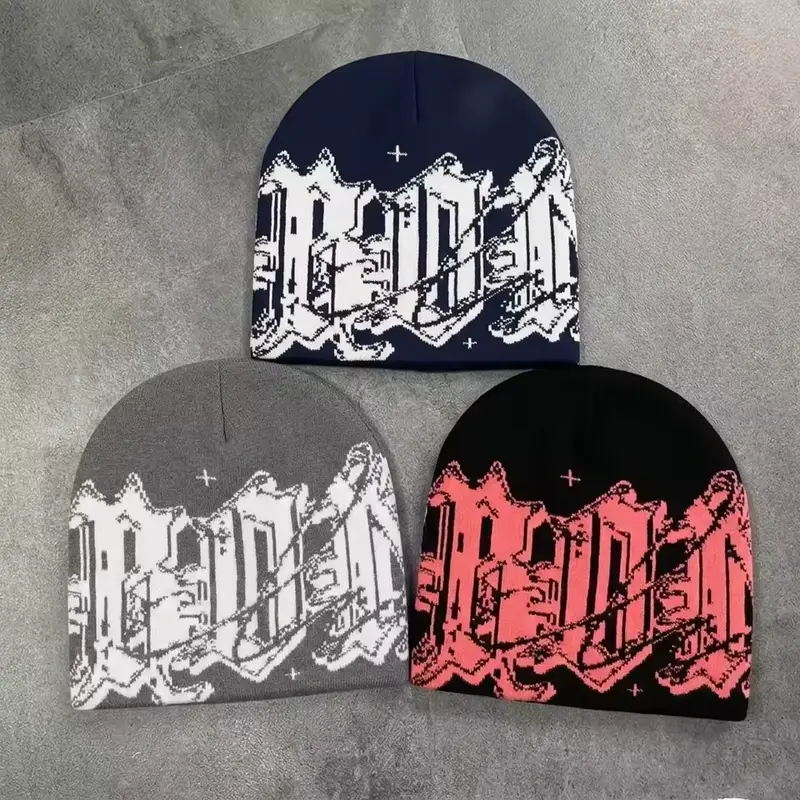Knit beanies with a repeating cityscape jacquard motif