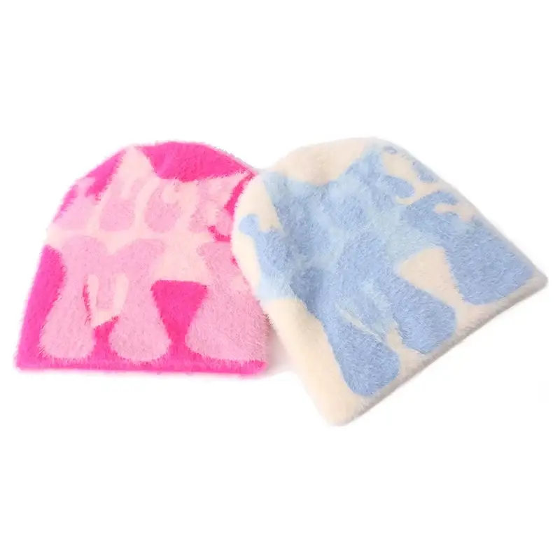 Pink and blue patterned cuffless beanies shown together