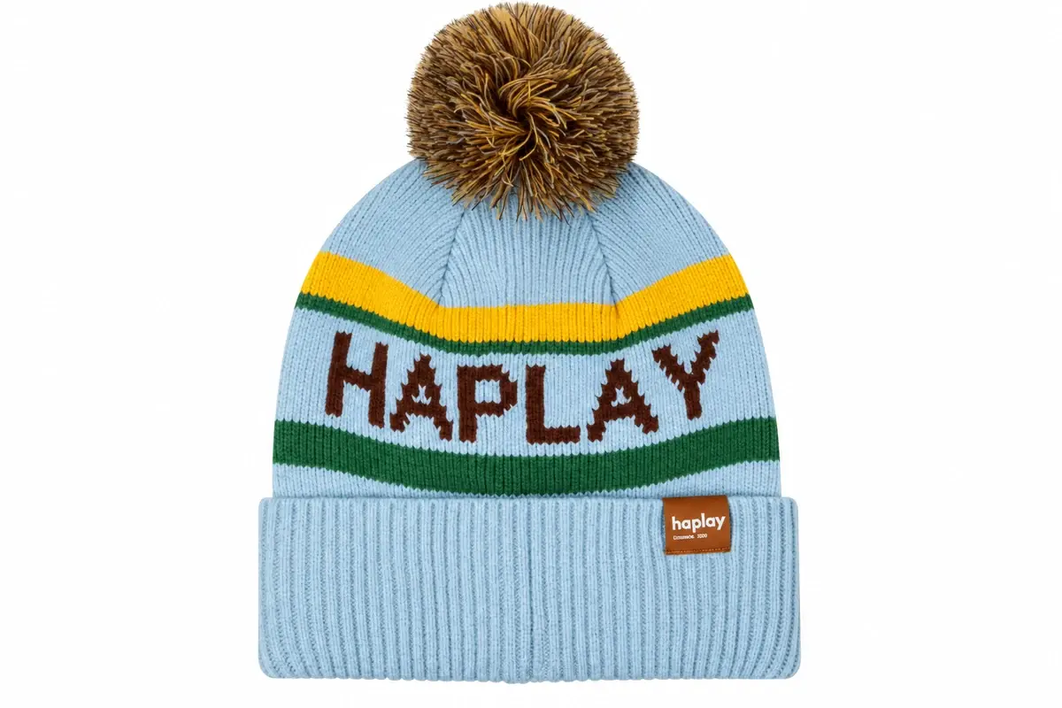 Pale blue HAPLAY jacquard pom pom beanie with yellow and green color bands