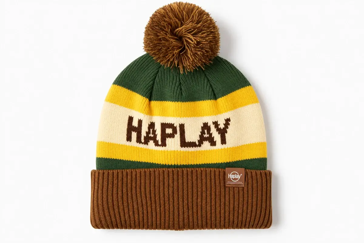 Dark green jacquard pom pom beanie with cream and yellow HAPLAY band