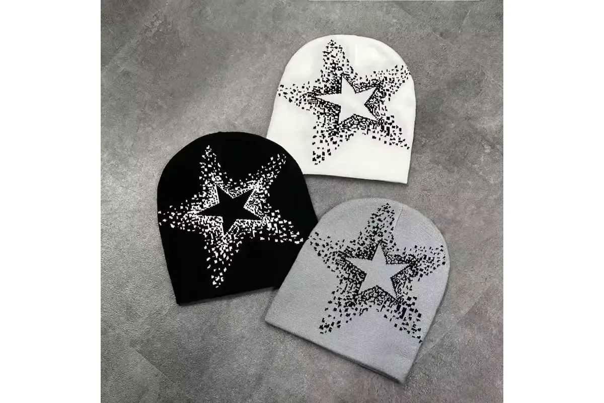 Three knit beanies with contrasting star motifs
