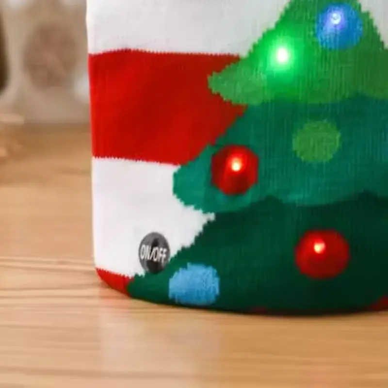 Lower front of the LED Christmas beanie with its accessible ON/OFF switch