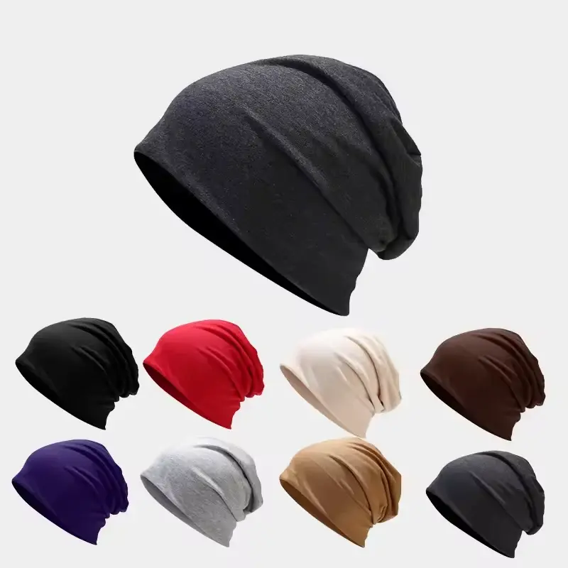 Slouchy knit beanies shown in black and other solid colors