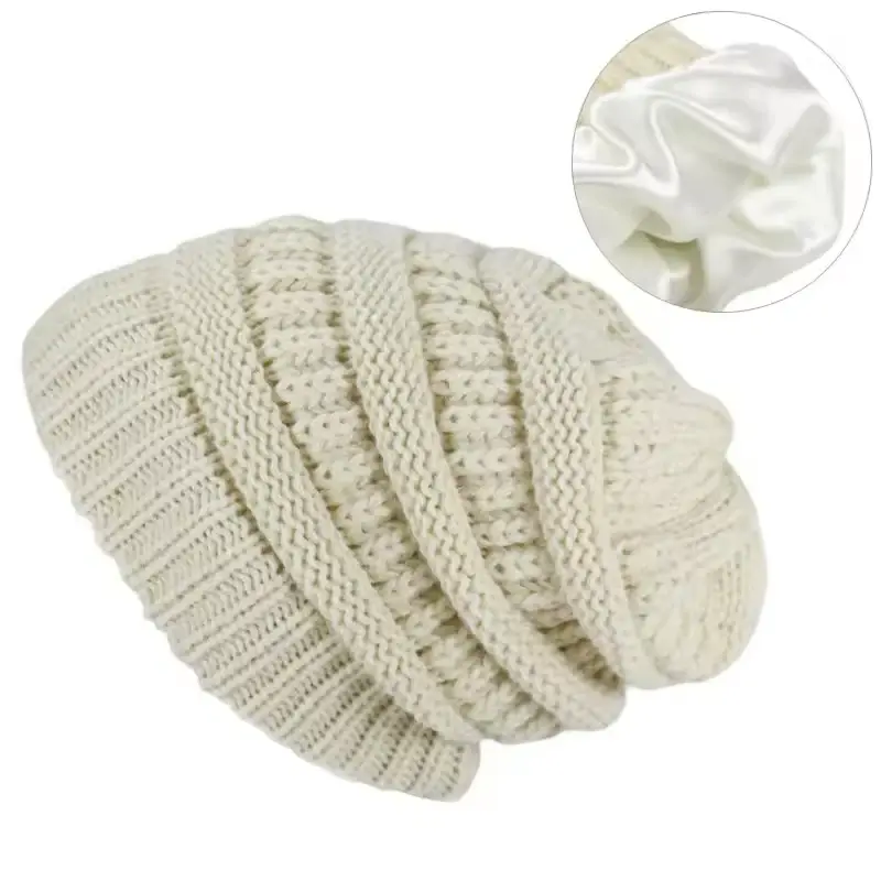 Cream cable-knit slouchy beanie with a soft crown