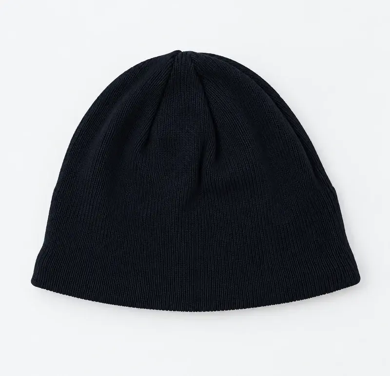 Plain navy rib-knit beanie with a clean cuffless fit, shown from the front