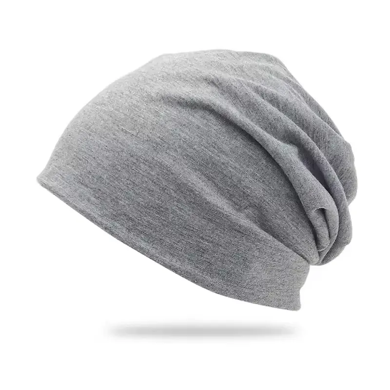 Gray slouchy knit beanie shown from the side