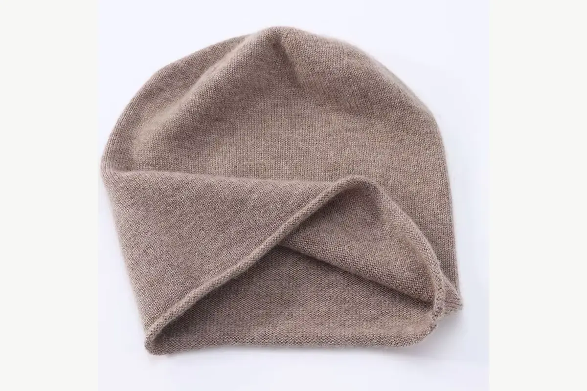 Brown knit cap turned inside out to reveal its soft inner fabric