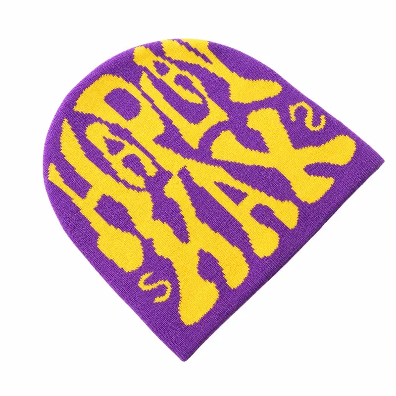 Purple low-profile cuffless beanie with yellow knitted lettering