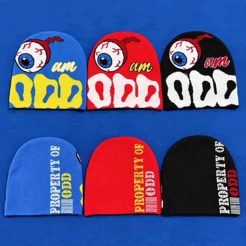 Blue, red and black cuffless beanies showing team colorways