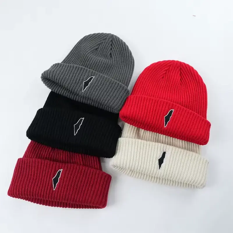Black, gray, red and white short beanies with front patches