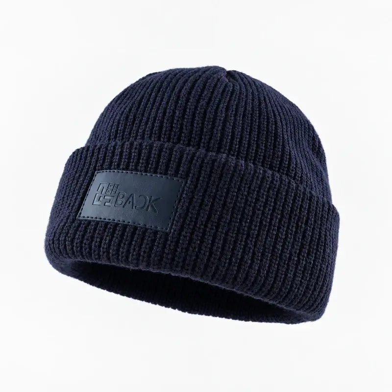 Dark navy vertically ribbed cuffed beanie with front patch