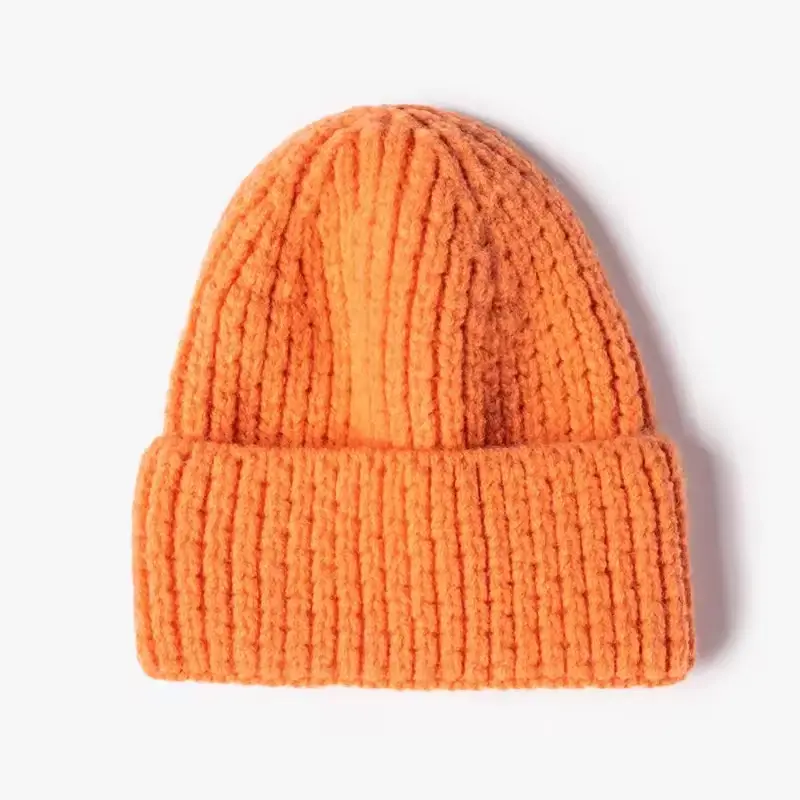 Orange chunky rib-knit beanie with a folded cuff